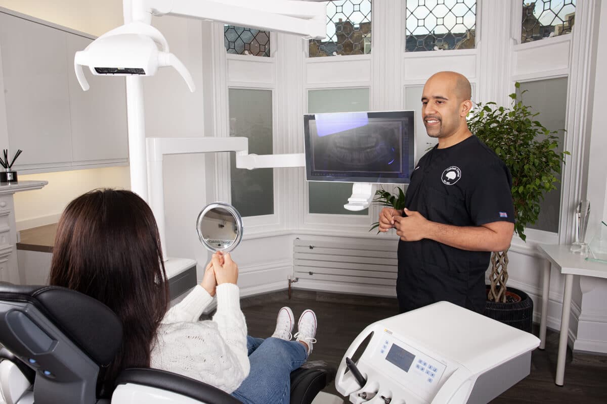 Oakdale-Placing-New-Teeth $variable({"type":"content","value":{"name":"post_title","settings":{"before":"","after":""}}})$